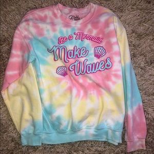 A mermaid tie dye sweater